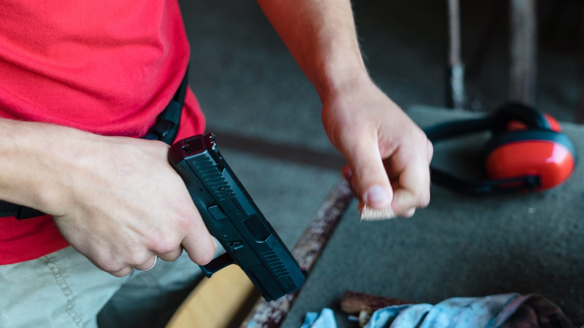 Close Up on Hand With Gun Close Up on Hand With Gun